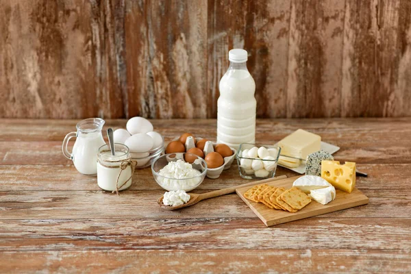 Cottage cheese, crackers, milk, yogurt and butter — Stock Photo, Image