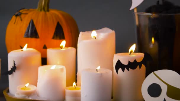 Pumpkins, candles and halloween decorations — Stock Video