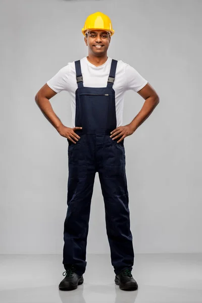 Happy smiling indian worker or builder in helmet — Stock Photo, Image