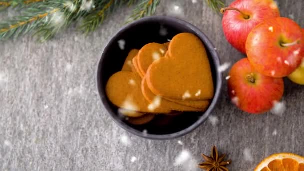 Glass of hot mulled wine, cookies, apples and fir — Stock Video