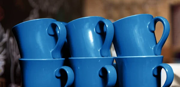 Stacked cups in classic blue color of year 2020 — Stock Photo, Image