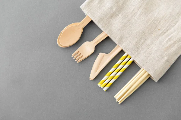 Wooden spoon, fork, knife, straws and chopsticks — Stock Photo, Image