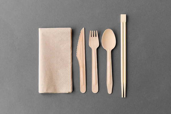 Wooden spoon, fork, knife and chopsticks — Stock Photo, Image