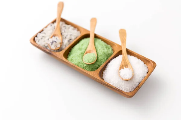 Sea salt and spoons on wooden tray — Stock Photo, Image