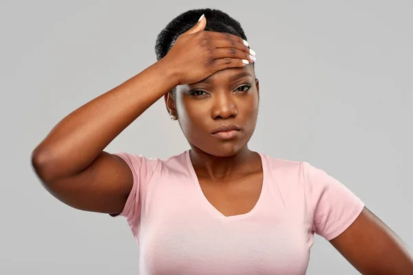 African american woman having headache or fever — Stock Photo, Image