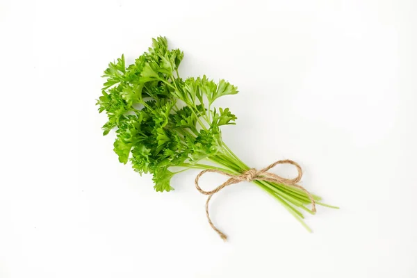 Bunch of parsley on white background — Stock Photo, Image