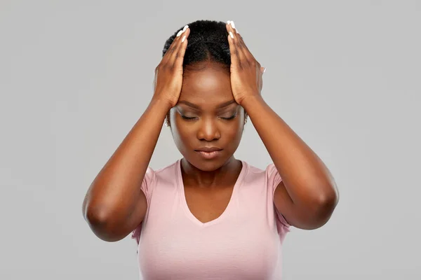 African american woman suffering from headache — Stock Photo, Image