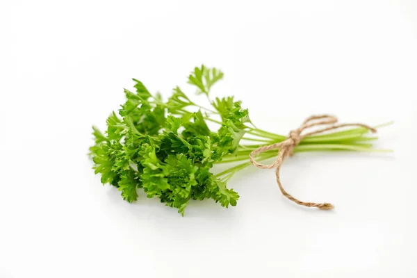 Bunch of parsley on white background — Stock Photo, Image