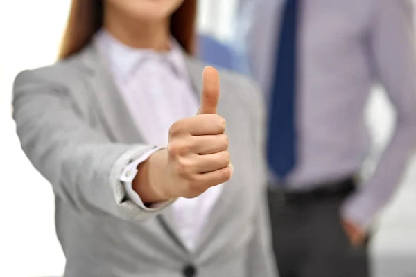 Close up of businesswoman showing thumbs up — Stock Photo, Image