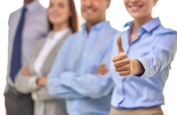 Close up of happy businesswoman showing thumbs up — Stock Photo, Image