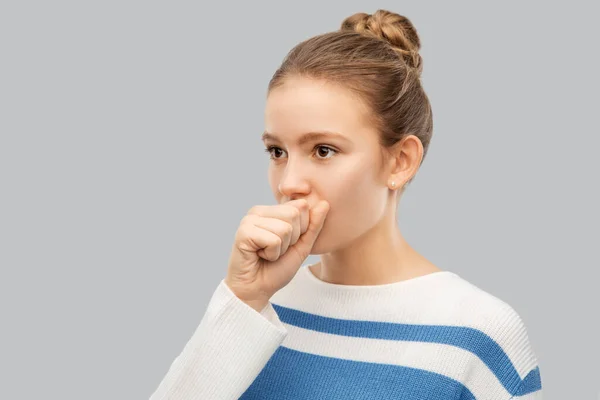 Sick coughing teenage girl in pullover — Stockfoto