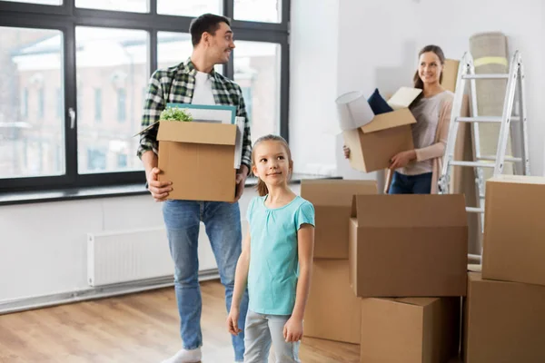 Happy family with child moving to new home — Stock Photo, Image