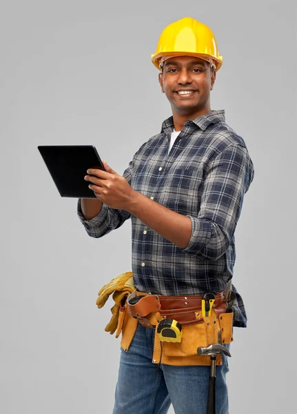 Happy indian builder in helmet with tablet pc — Stock Photo, Image