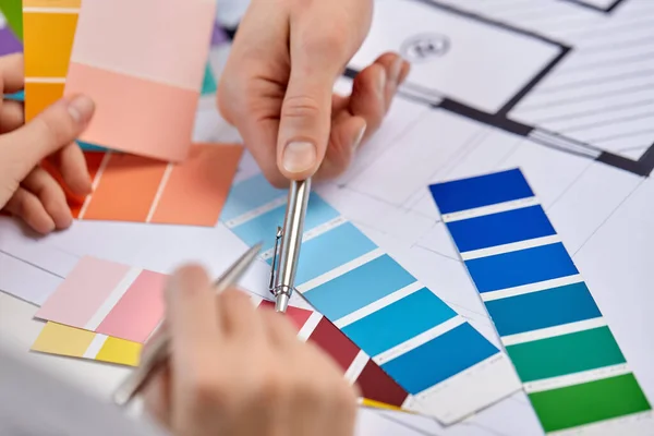 Close up of designers team working with blueprint — Stock Photo, Image