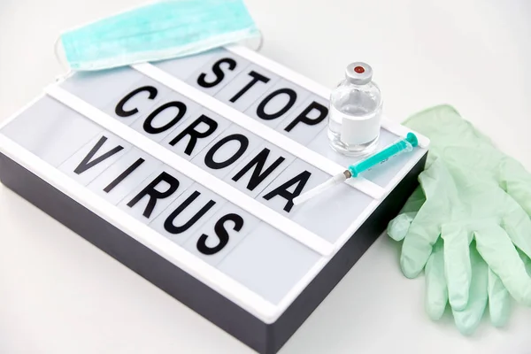 Lightbox se stopkou koronavirus varování slova — Stock fotografie