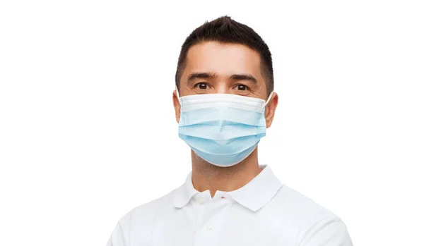 Portret van de mens in beschermend medisch masker — Stockfoto