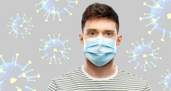 Ung man i skyddande medicinsk mask — Stockfoto