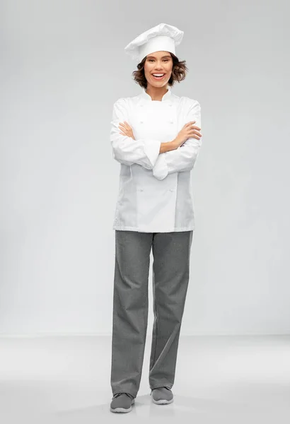 Sorridente chef donna in toque — Foto Stock