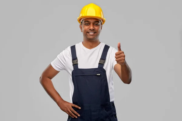 Šťastný indický dělník nebo stavitel ukazující palce nahoru — Stock fotografie