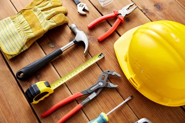 Different work tools on wooden boards — Stock Photo, Image