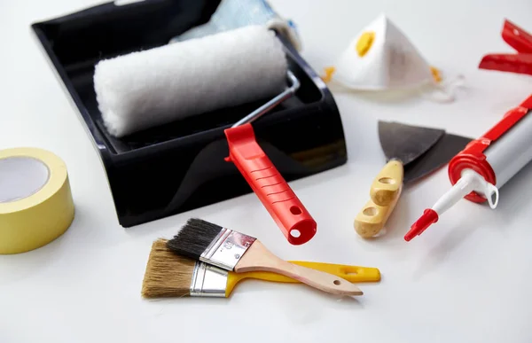 Different painting work tools on white background — Stock Photo, Image