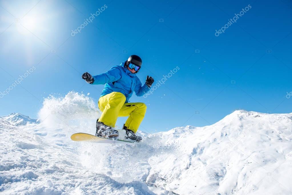 Active snowboarder in the mountains