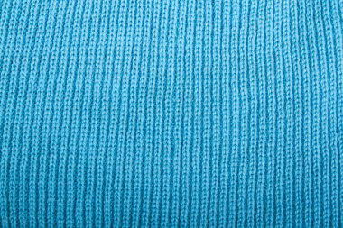 arka plan olarak mavi örme kumaş