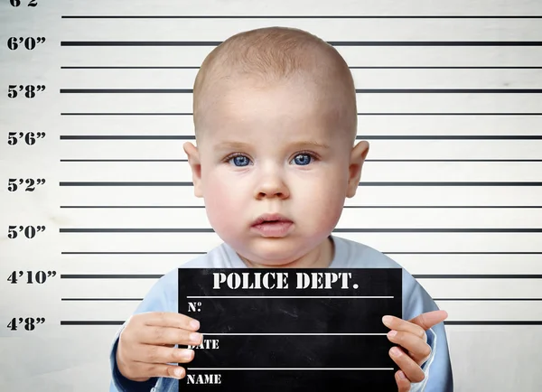 Little boy on a prison board — Stock Photo, Image