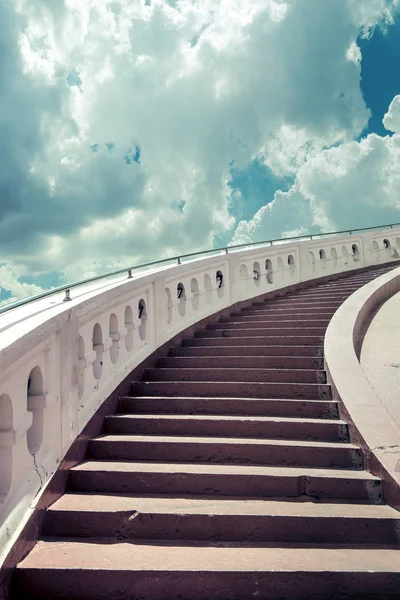 Stairs towards blue sky with clouds — Stock Photo, Image