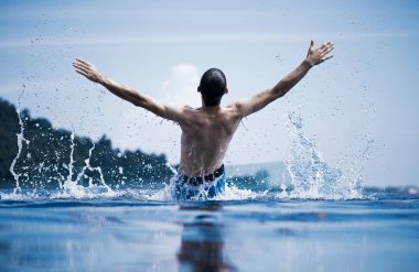 Young man enjoying the vacation in paradise