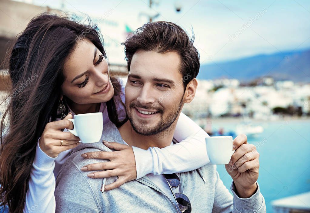 Romantic couple drinking a mornig cup of coffee