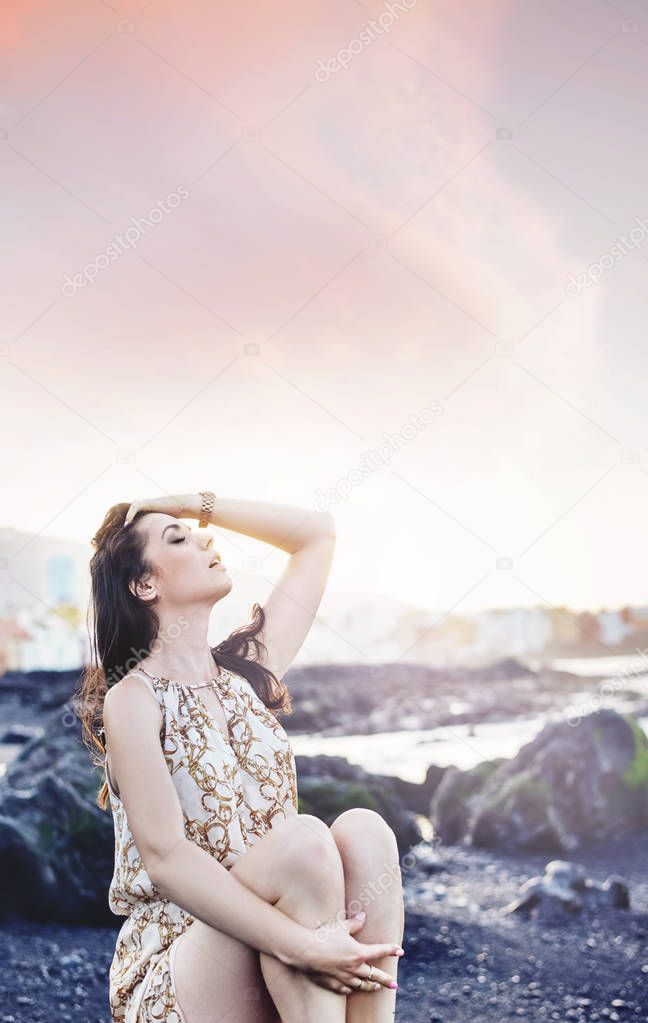 Portrait of a sensual lady on a tropical brunette