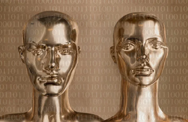 Duas peças de esculturas humanas douradas Fotografia De Stock