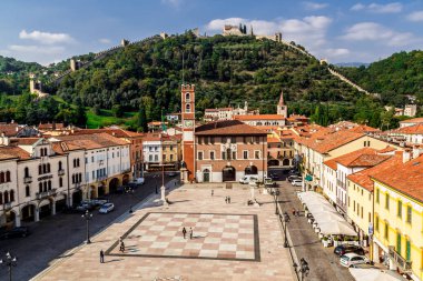 Marostica, Italy - Oktober, 01, 2017: View of the old building, chess square and castle on the mountain.