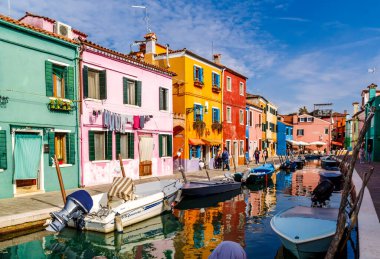 Venice, Italy - October, 2017: Colorful houses on Burano, island in the Venetian Lagoon.