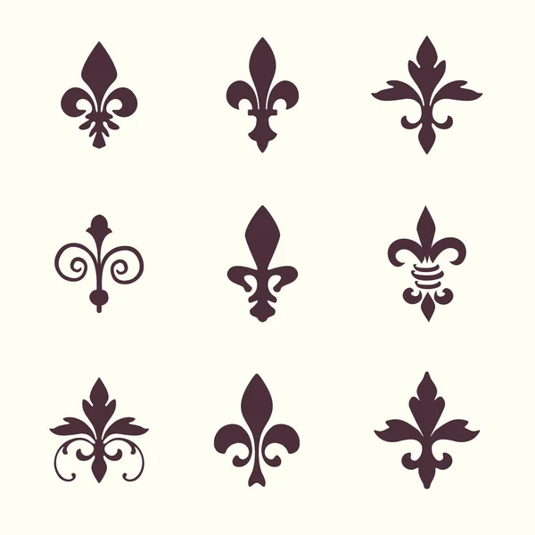 Heraldikai szimbólumok fleur de lis vektor készlet — Stock Vector