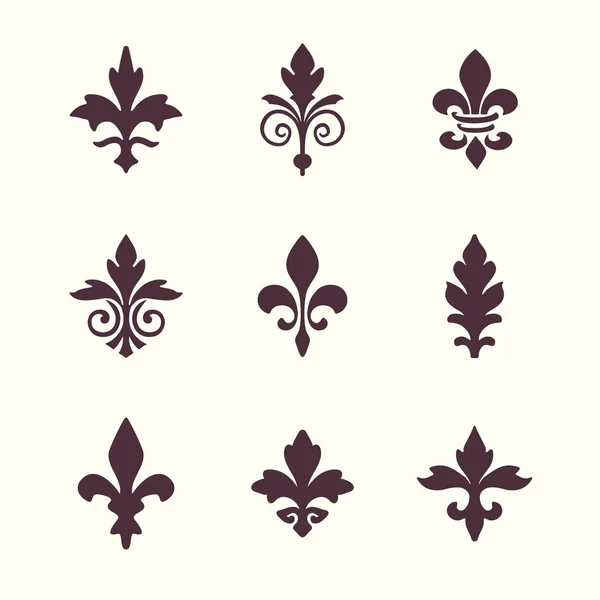 Heráldica símbolos fleur de lis vector conjunto — Archivo Imágenes Vectoriales