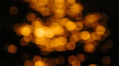 Deniz su yüzeyinde günbatımı ışığın soyut bokeh