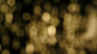 Deniz su yüzeyinde günbatımı ışığın soyut bokeh