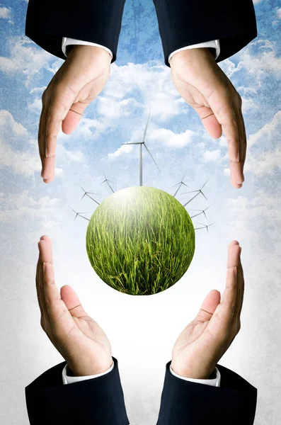 Sustainable concept, Planet of wind turbine fly over hand — Stock Photo, Image