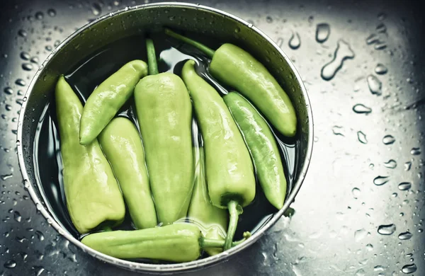 Bell pepper in bowl with water — Stock Photo, Image