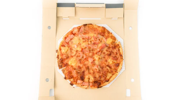 Delicious pizza inside paper box package on white background — Stock Photo, Image