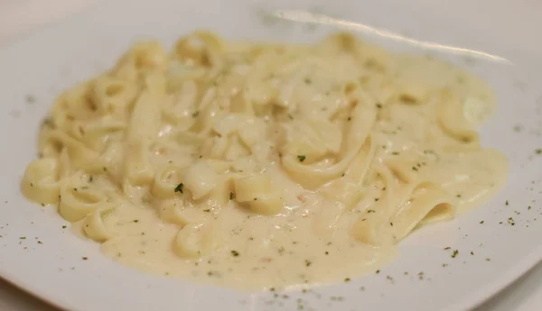 Pasta with cream cheese sauce — Stock Photo, Image