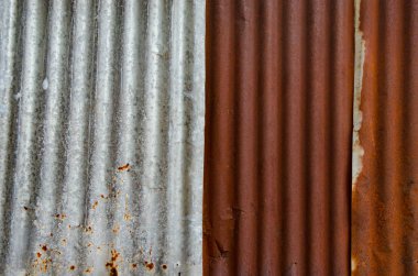 Paslı çinko çatı, Doku arka plan