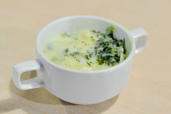 Mushroom soup in white bowl on wooden table — Stock Image Mushroom soup in white bowl on wooden table Stock Picture