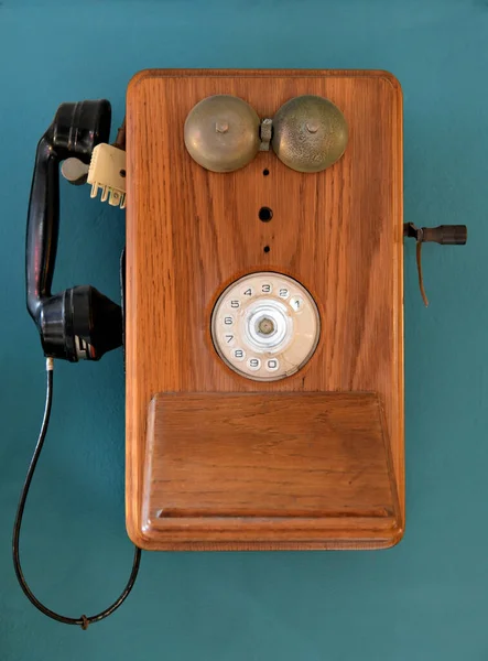 Vintage telephone hanging on a wall