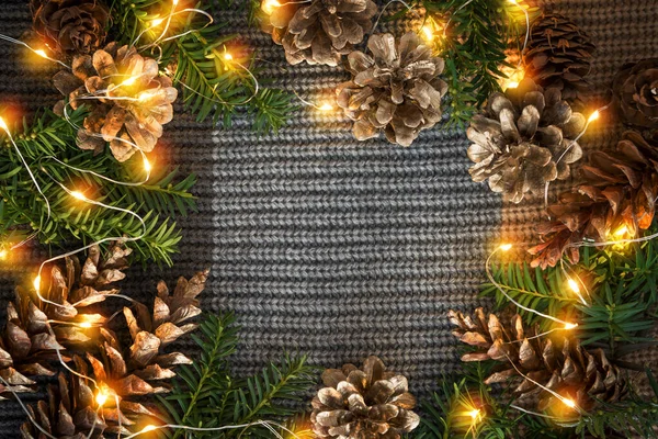 Christmas dark decoration background of a knitted sweater — Stock Photo, Image