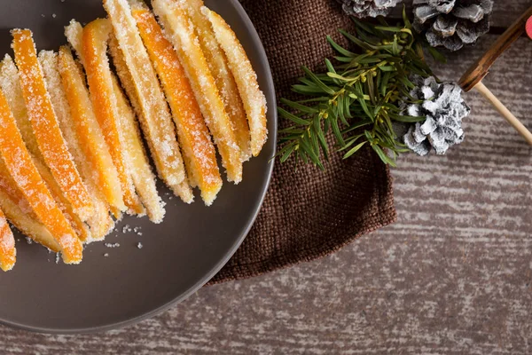 Candied orange peel in sugar is a favorite Christmas treat for children and adults — Stock Photo, Image