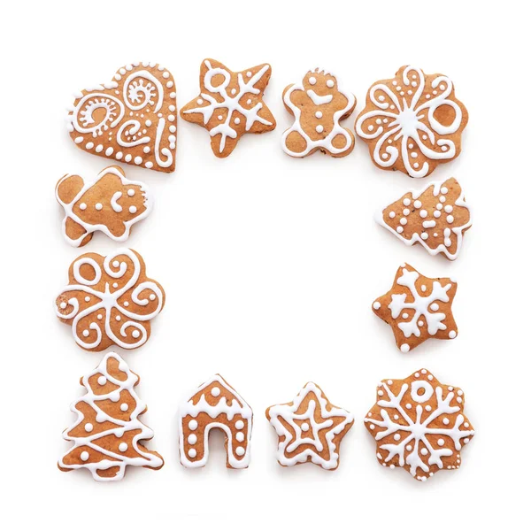 Xmas gingerbread cookies on pastel pink background — Stock Photo, Image