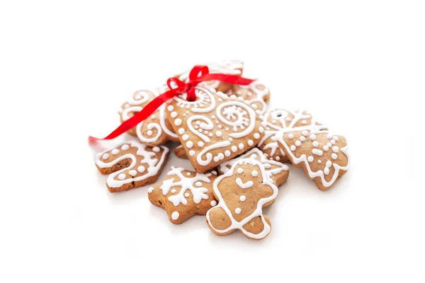 Xmas gingerbread cookies on pastel pink background — Stock Photo, Image